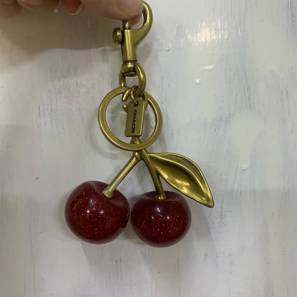 Coach Gold-Tone Glitter Cherry Key Charm in Red